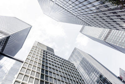 Low angle view of modern buildings against sky