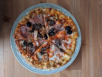 High angle view of pizza in bowl on table