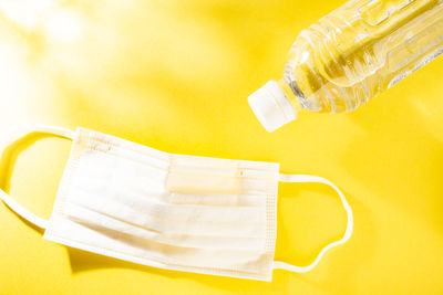 High angle view of coffee cup against white background