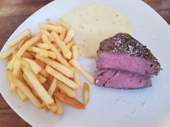 High angle view of meat served in plate on table