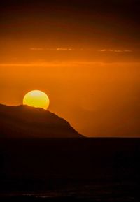 Scenic view of moon at sunset