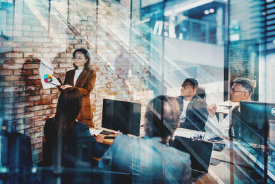 Business colleagues working in office