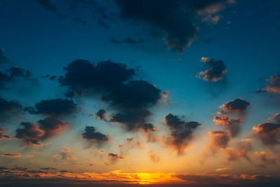 Low angle view of dramatic sky during sunset