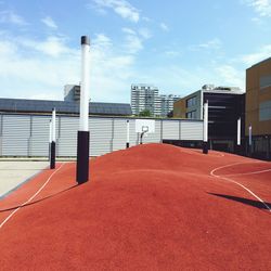 Empty basketball court against the sky