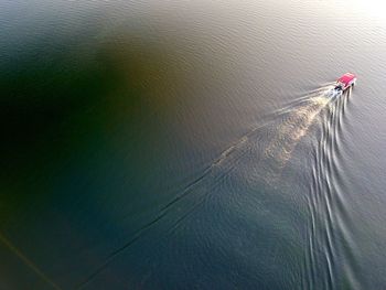 High angle view of sailboat sailing in sea