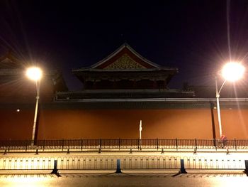 Illuminated street light at night