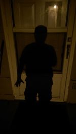 People standing at night
