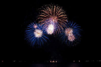 Firework display at night