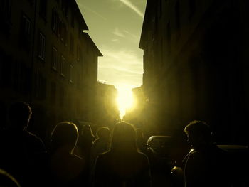 Silhouette of people at event