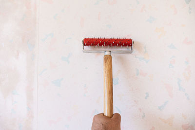 Home renovation project, removing old wallpaper from wall