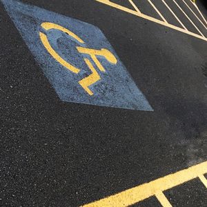 High angle view of arrow symbol on road