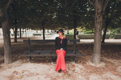 Full length of woman standing in park