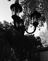 Low angle view of street light against sky