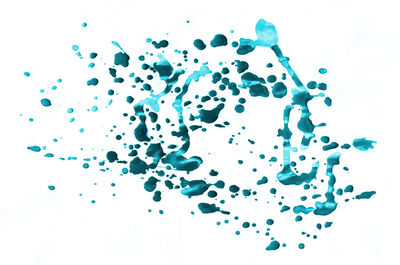 Close-up of bubbles against white background