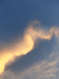 Low angle view of clouds in sky during sunset