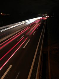 Light trails on road at night