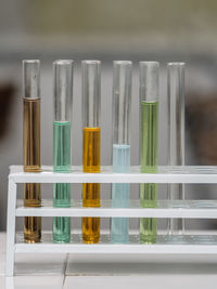 Close-up of test tubes on table