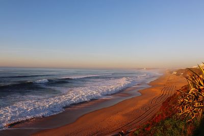 Scenic view of sea against sky during sunset