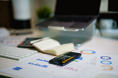 Close-up of calculator on table