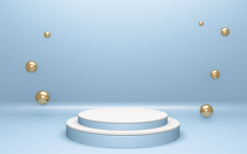 Close-up of light falling on table against white background