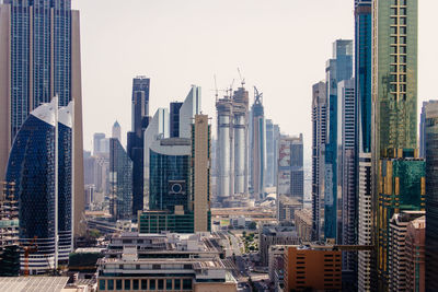 Modern buildings in city against sky