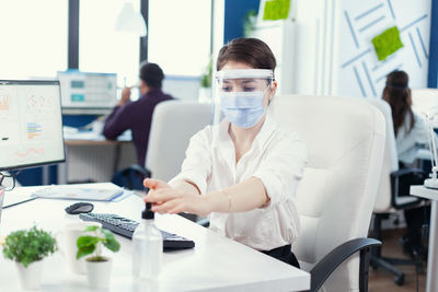 Portrait of female scientist working in laboratory