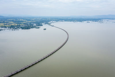 Aerial view of railway bridge above the reservoir of pa sak jolasid dam at lopburi, amazing thailand 