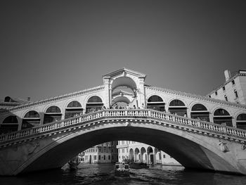 Bridge over river against clear sky
