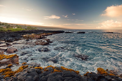 Scenic view of sea against sky during sunset