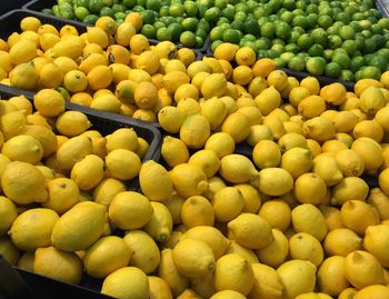 High angle view of lemons for sale in supermarket