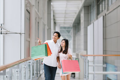 Young couple walking outdoors