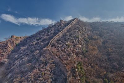 Fort walls of alwar fort running on the hills range in rajasthan india