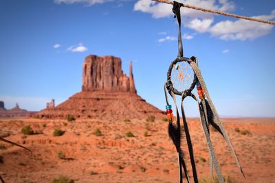 Close-up of rope against blue sky