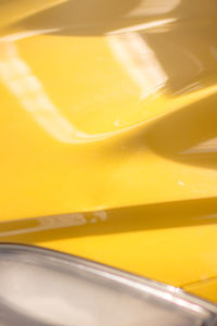 Close-up of yellow machine