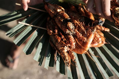 Close-up of meat on barbecue grill