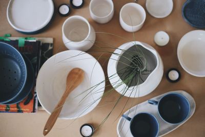 High angle view of kitchen utensils on table