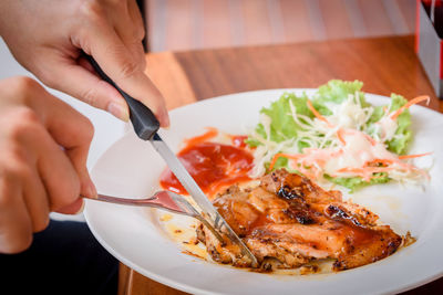 Close-up of person eating food