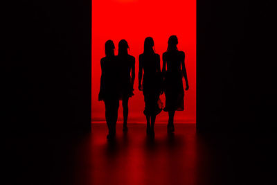 Silhouette of fashion models on walking during fashion show
