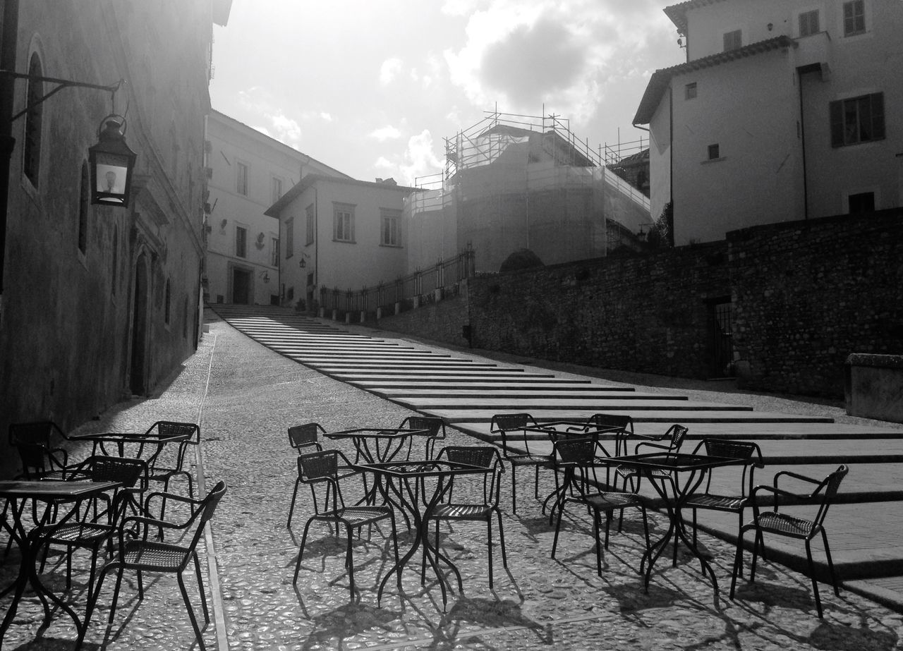 architecture, built structure, building exterior, house, sky, residential structure, residential building, the way forward, building, day, no people, outdoors, cobblestone, empty, town, cloud - sky, railing, absence, street, old