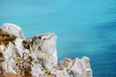 High angle view of rocks on beach