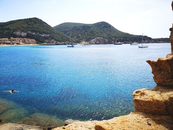 Scenic view of bay against sky