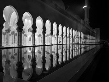 Row of illuminated building at night