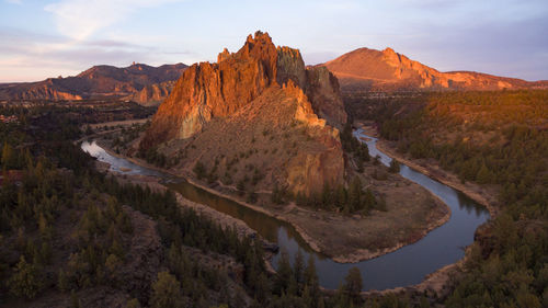 Panoramic view of landscape with mountain range in background