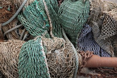 High angle view of fishing net in boat