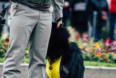 Midsection of person standing outdoors