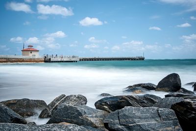 View of calm river against the sky