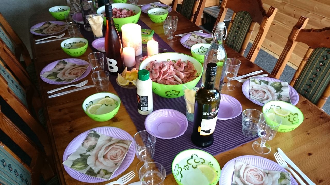 indoors, table, still life, variation, high angle view, arrangement, large group of objects, choice, food and drink, plate, food, abundance, multi colored, freshness, no people, directly above, wood - material, bottle, collection, order