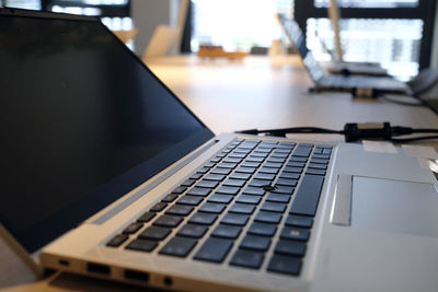 Close-up of laptop on table