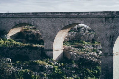 Arch bridge over river