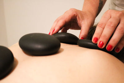 Close-up of woman hands on table